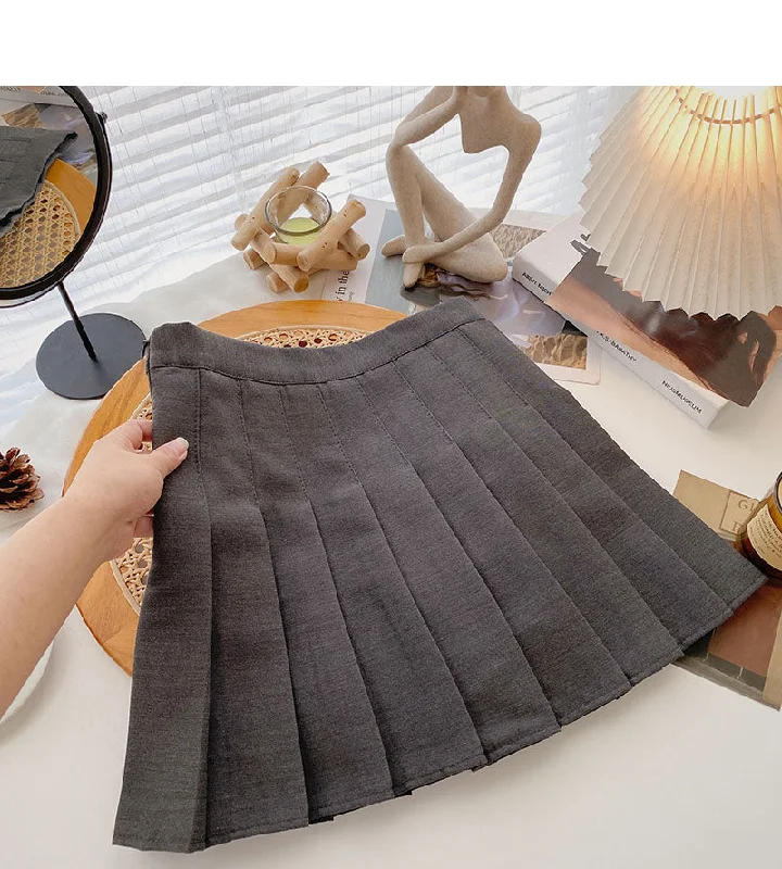 Korean version aging solid color high waist A-shaped short skirt 5581 high slit skirt Korean version aging solid color high waist A-shaped short skirt 5581 high slit skirt